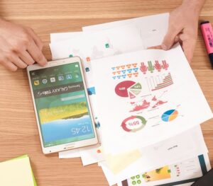budget papers on a desk with graphs