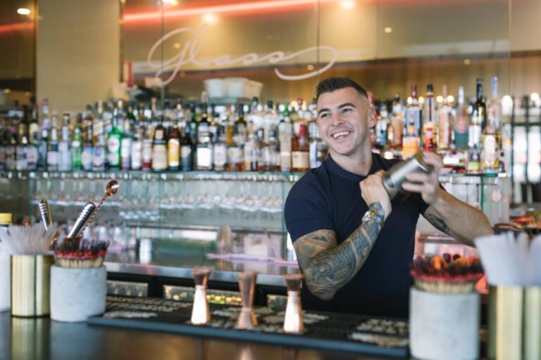 Bartender shaking cocktail - self-employment-assistance-program