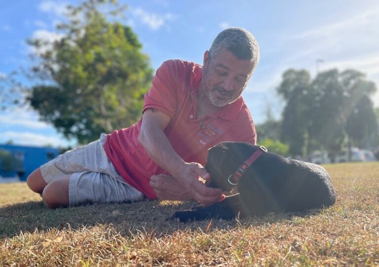 Man in park with dog